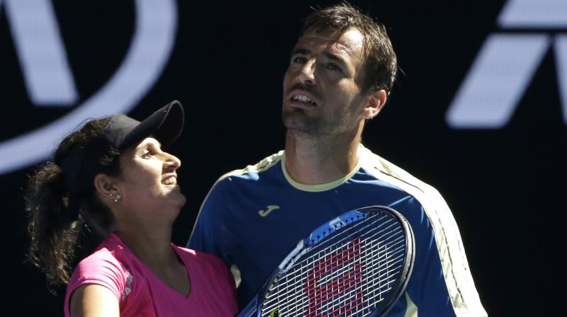 Sania Mirza and Ivan Dodig, who defeated Samantha Stosur and Sam Groth 6-4, 2-6, 10-5 in the semifinals, next face the winners of the other semifinal between Elina Svitolina and Chris Guccione and the combo of Abigail Spears and Juan Sebastian Cabal. (Photo: AP)