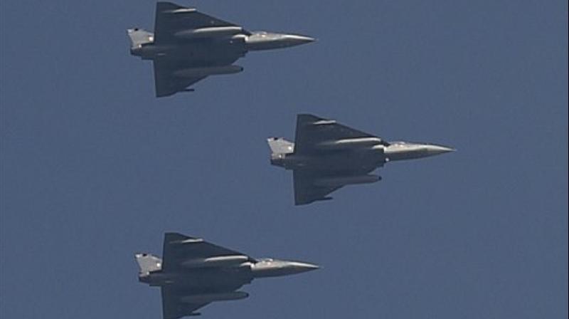 Indian Air Forces Tejas planes flying past for the first time during a full dress rehearsal for the Republic Day Parade at Rajpath in New Delhi. (Photo: AP)