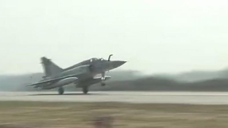 The Indian Air Force on Tuesday began its drill to touch and go landing with 16 planes performing the exercise on a stretch of the Lucknow-Agra Expressway. (Photo: Twitter | ANI)