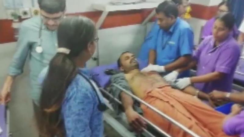 Three BJP workers injured at Vadanappally in Thrissur district during clashes with Social Democratic Party of India (SDPI) workers. (Photo: ANI)