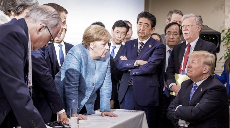 War of images: Angela Merkel wins G7 photo duel of world leaders