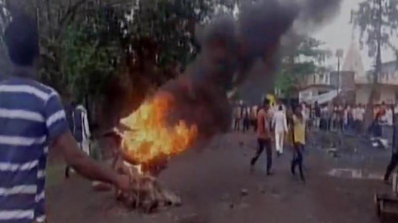 Farmers protest turned violent after they claimed their land is being acquired by Ministry of Defence. (Photo: ANI/Twitter)