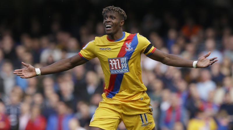 Wilfried Zaha spearheaded Palaces daring attacking display, canceling out Cesc Fabregass fifth-minute opener before setting up striker Christian Benteke for the winner moments later. (Photo: AP)