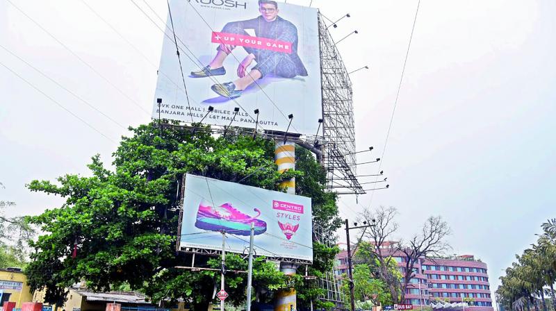 Several advertising agencies violate rules and either increase the size of the hoarding or erect it with poor quality metal which may collapse at any time.  (Image: DC)