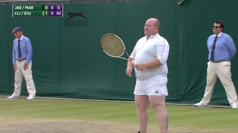 Clijsters went over to the sideline and grabbed a white skirt for the man to put over his blue shorts. and because he had on a light green shirt, he also was given a white shirt to pull on.