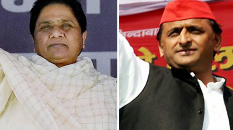 Chief Minister Akhilesh Yadav, BSP supremo Mayawati and Home Minister Rajnath Singh on Sunday casted their votes in the third phase of UP elections and claimed that their parties will form the next government. (Photo: PTI)