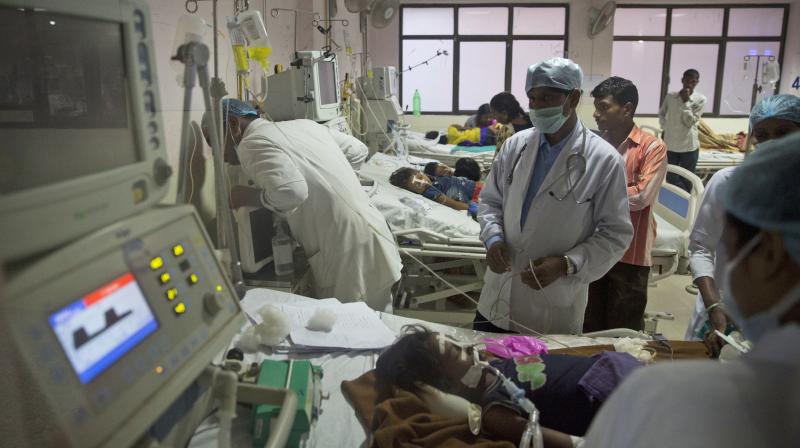 Children receive treatment at Baba Raghav Das Medical College Hospital in Gorakhpur, Uttar Pradesh. (Photo: AP)