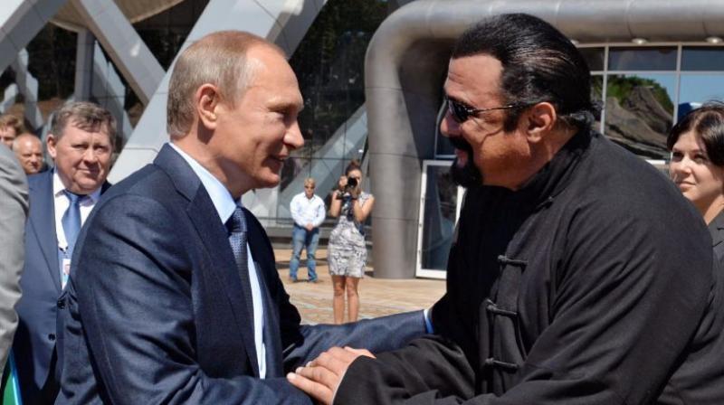 The 64-year-old actor has been a regular visitor to Russia in recent years and has accompanied Putin to several martial arts events (Photo: yahoo.com)