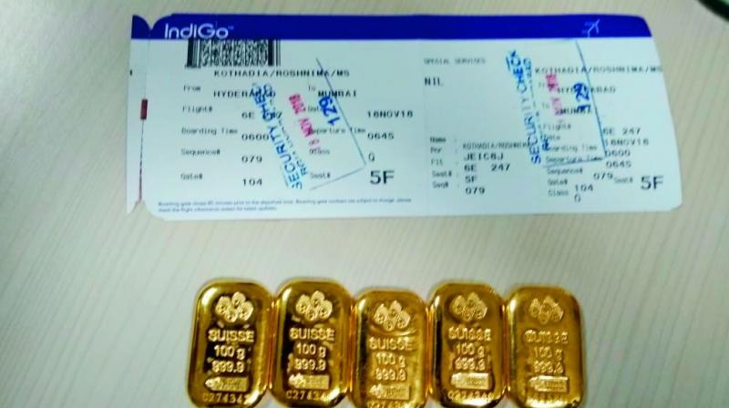 During intensive physical baggage check, the personnel recovered five gold bars each weighing about 100 gm.