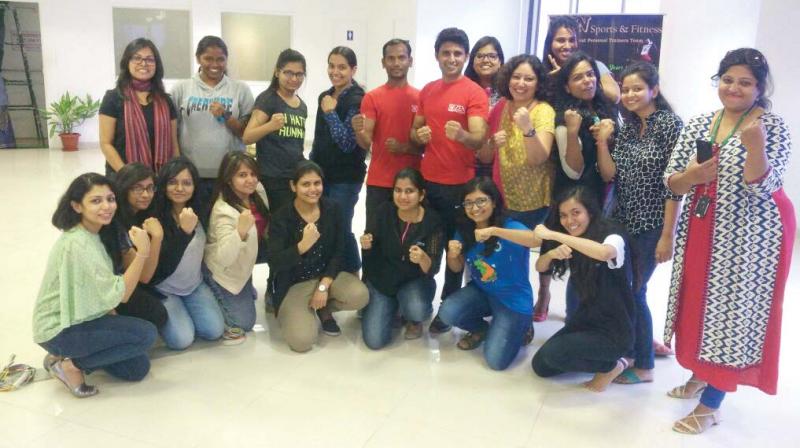 A file picture of girls at a martial arts class with trainer Prasad.