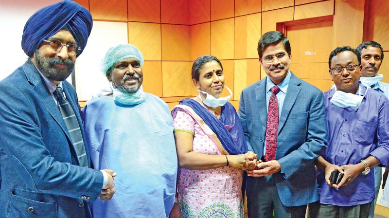 Team of doctors from Gem Hospital with Sheeba who donated a part of her liver to her husband Balasubramaniam on Saturday in Coimbatore (Photo: DC)
