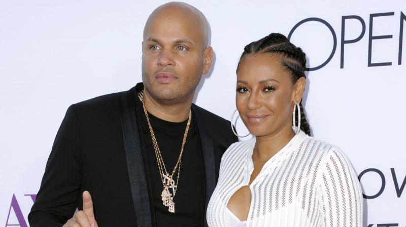 Stephen Belafonte, left, and his wife Melanie Brown (Photo: AP)