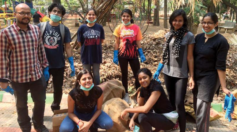 A volunteer group from the city, cleaning up public spaces.