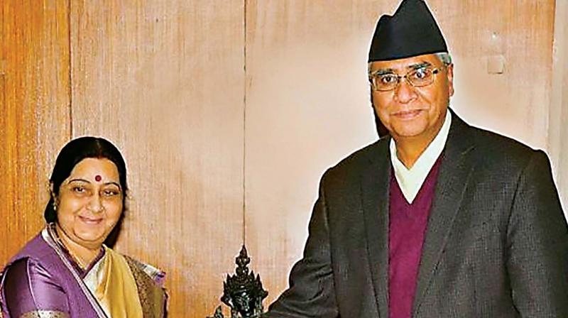 External Affairs Minister Sushma Swaraj with Nepal Prime Minister Sher Bahadur Deuba during her visit to Kathmandu on Friday. (Photo: PTI)