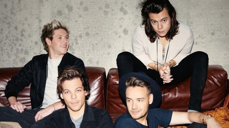 One Direction band members Niall Horan (top left), Harry Styles (top right), Louis Tomlinson(L) and Liam Payne(R).