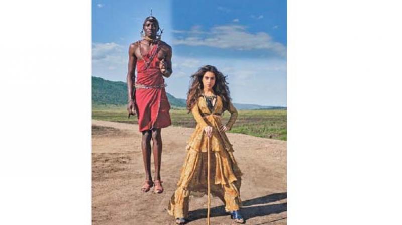 In the photographs released by the magazine, one sees a bohemian-dress wearing Sara Ali Khan posing in front of, what can only be described as, a levitating Masai tribesman.
