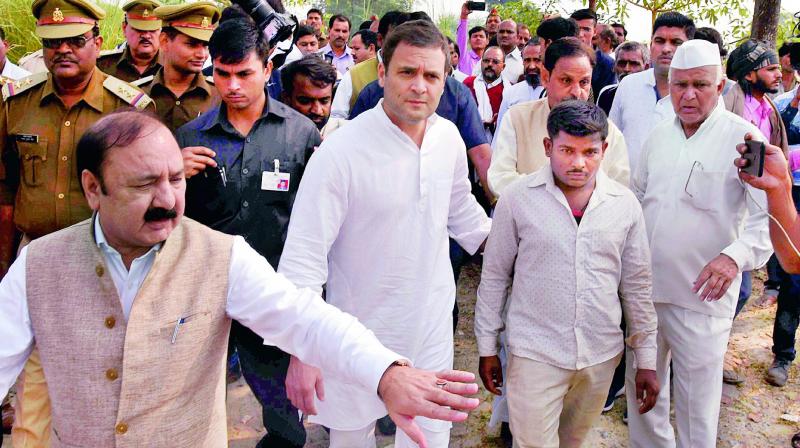 Congress vice-president Rahul Gandhi arrives to meet the family members of the victims of Unchahar NTPC boiler blast in Raebareli on Thursday. (Photo: PTI)