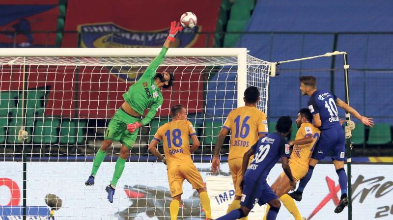 Amrinder Singh of Mumbai City FC jumps to defend a corner during the match against Chennaiyin FC in the Indian Super League in Chennai. (Photo: ISL)