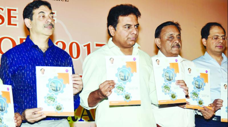 Minister K.T. Rama Rao along with other senior officials release the Annual report of the industries department in Hyderabad on Monday.  (Photo:DECCAN CHRONICLE)