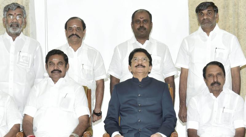 Chief Minister Edappadi K Palanisamy with Governor CH Vidyasagar Rao and his cabinet colleagues pose for a group photograph after swearing-in ceremony at Raj Bhavan in Chennai. (Photo: PTI)