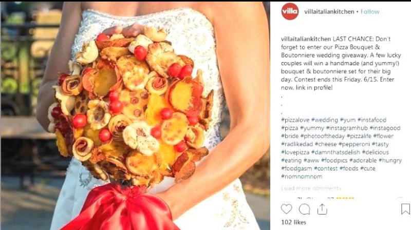 A bride with a beautifully crafted pizza bouquet. (Photo: https://www.instagram.com/p/BkBBleun2EZ/)