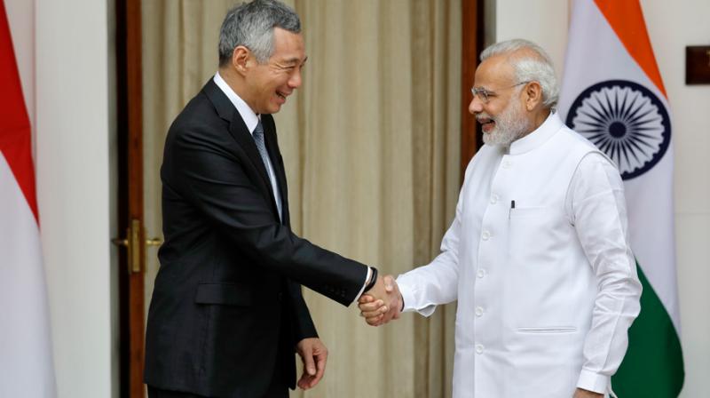 Prime Minister Narendra Modi with his Singapore counterpart Lee Hsien Loong in New Delhi. (Photo: PTI)