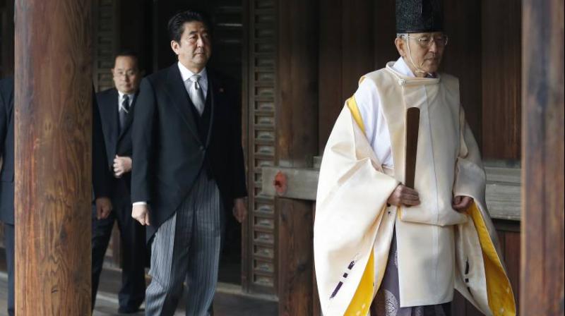Shinzo Abe during his last visist to the Yasukuni Shrine (Photo: AP)