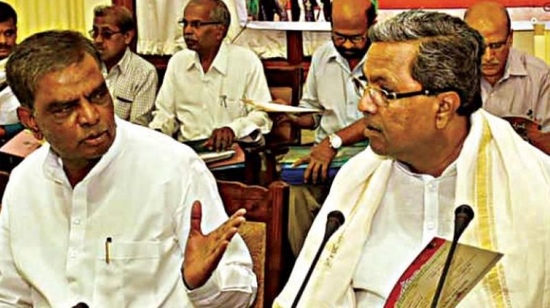 A file photo of MLA V. Srinivas Prasad with CM Siddaramaiah