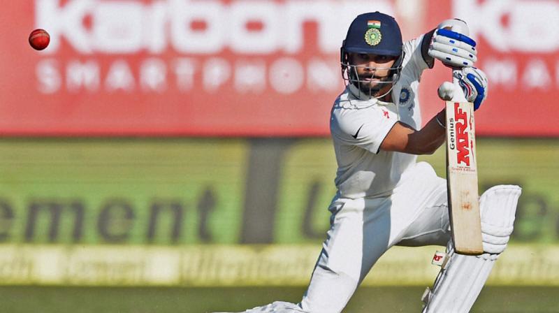 Virat Kohlis unbeaten 49-run innings helped India secure a draw in the first Test against England in Rajkot. (Photo: PTI)