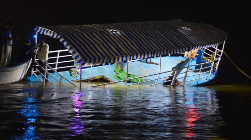 The ill-fated boat which was towed to the Ferry Ghat near Pavitra Sangamam in Vijayawada on Sunday. (Photo: DC)