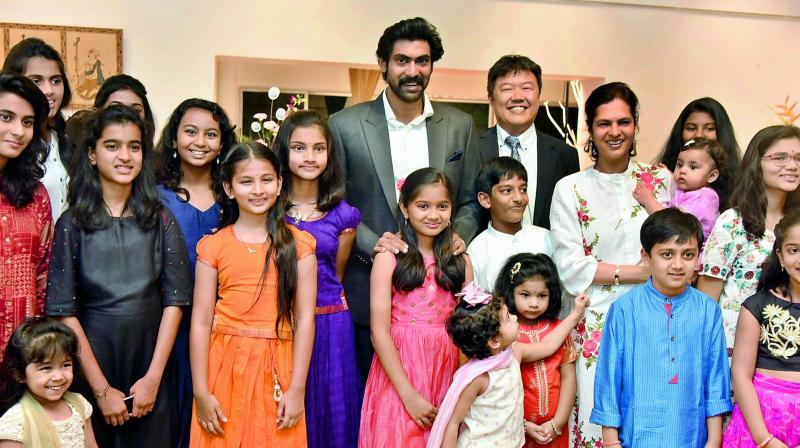 Rana Daggubati with the participating children at the Ikebana exhibition on Tuesday