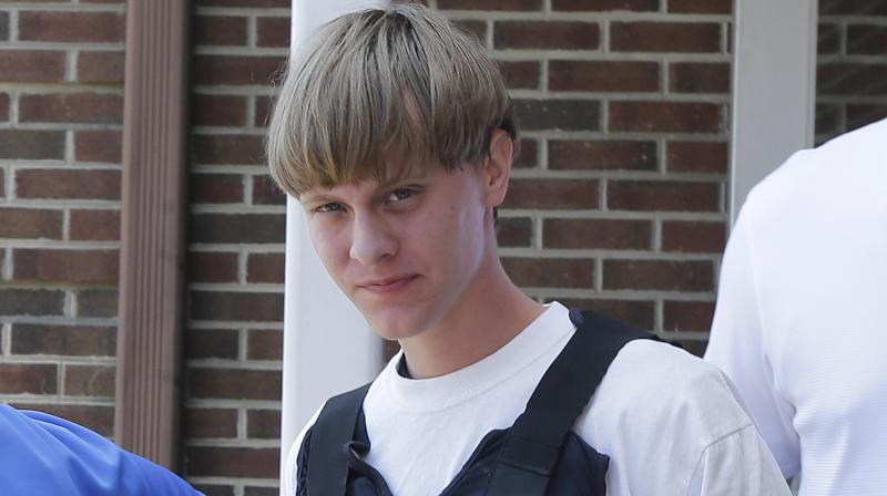 Dylann Storm Roof is escorted from the Sheby Police Department in Shelby, N.C. (Photo: AP)