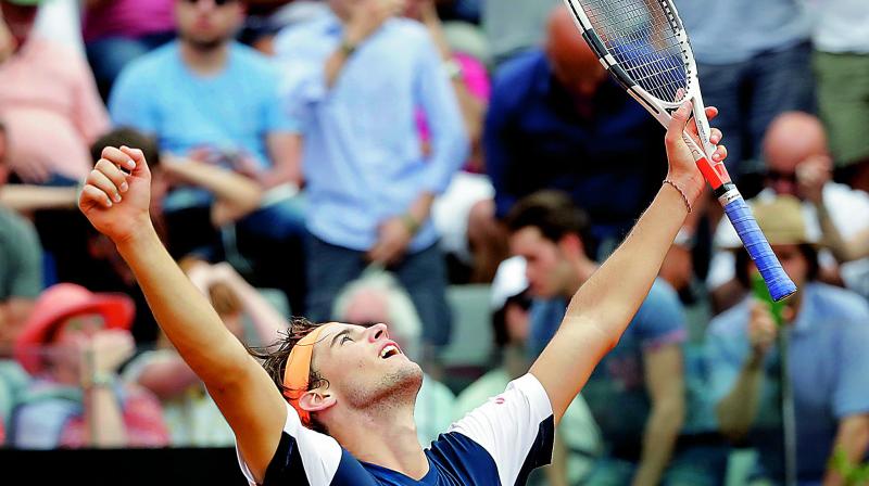 Dominic Thiem of Austria celebrates after beating Rafael Nadal at the Italian Open tennis tournament in Rome. (Photo: AP)