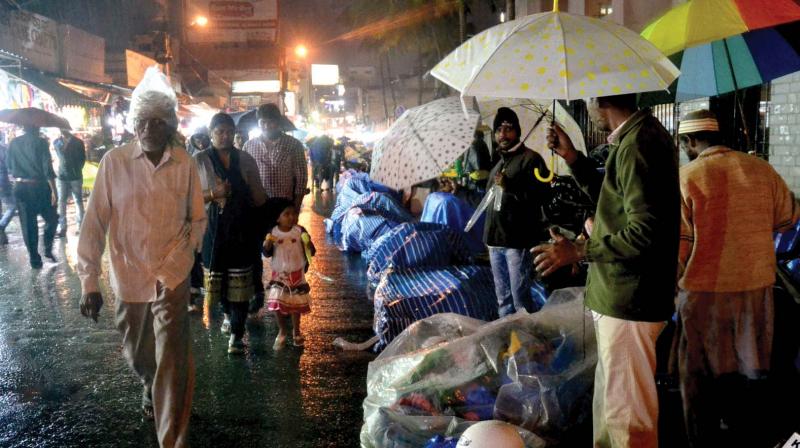 Bengaluru received showers on Monday evening, because of Cyclone Vardah, making the city temperature di.