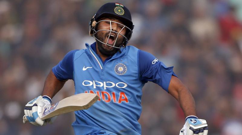Rohit Sharma, who was leading the Indian side in absence of Virat Kohli, also became the only batsman to score three double tons in ODIs and two against the same opposition. (Photo: AP)