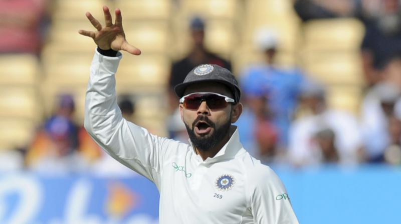 Virat Kohli has lit the fuse with a mic-drop to celebrate Joe Roots run-out on Day 1 of the first Test at the Edgbaston in Birmingham on Wednesday. (Photo: AP)