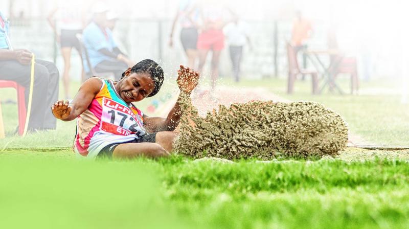 P.V. Viny of Mundur HSS, Palakkad, wins gold in long jump in the senior girls category. Her school trains only local talents for the athletic meets. (Photo: AKHIN DEV)