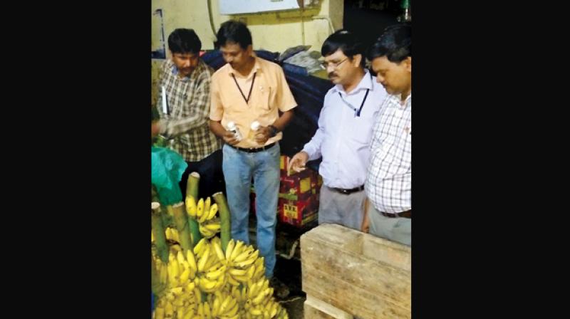 Officials seizes  artificially ripened fruits and chemicals used for ripening at Koyambedu market on Saturday.(Photo: DC)