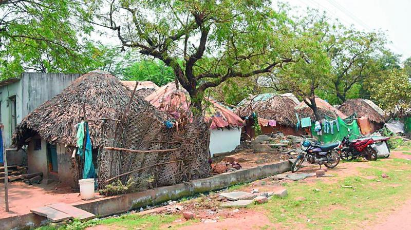 Makeshift houses on the tank bund hafe been a major obstacle in the beautification plan. (Photo: DC)