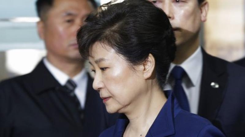 Ousted South Korean President Park Geun-hye arrives at the Seoul Central District Court for hearing on a prosecutors request for her arrest for corruption, in Seoul, South Korea. (Photo: AP)