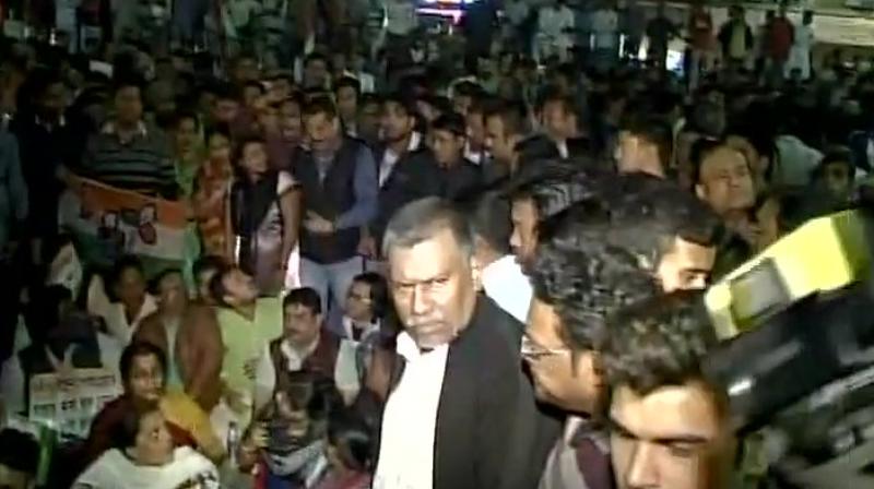 TMC workers protest, pelt stones and try to enter BJPs Kolkata office after TMC MP Sudip Bandyopadhyays arrest. (Photo: Twitter/ANI)