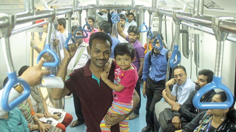 Commuters enjoying a ride on newly opened Green Line of Namma Metro on Sunday  (Photo:DC)