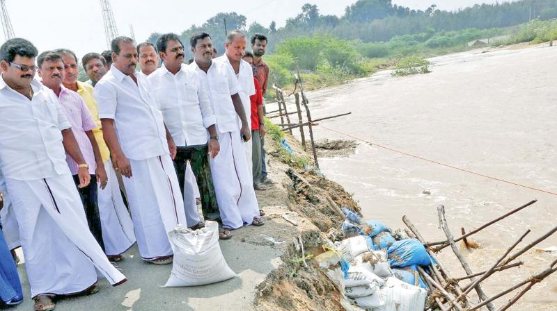 Chennai Corporation workers raze down encroachments along Otteri high road on Saturday. (Photo: DC)