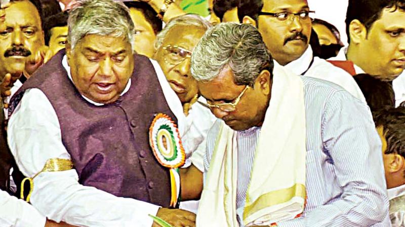 Chief Minister Siddaramaiah with former CM Dharam Singh at  his 80th birthday celebrations in Kalaburagi on Sunday