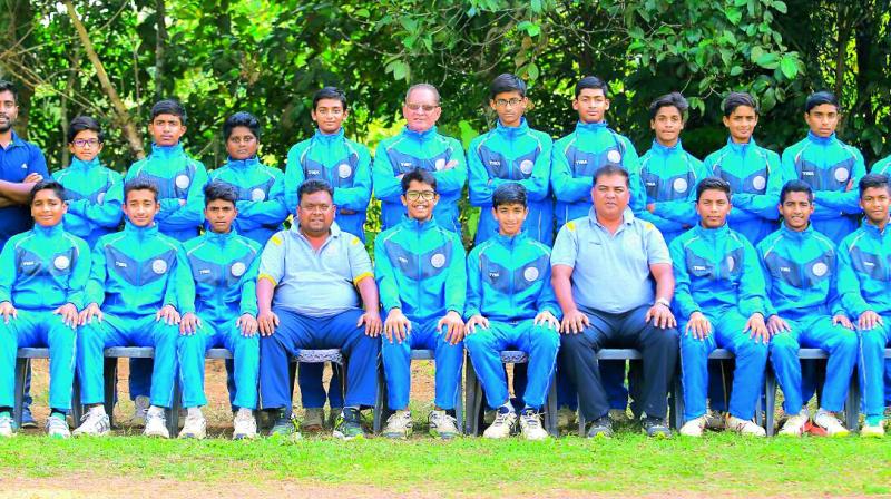 Members of the Hyderabad Under 14 cricket team pose after finishing runners-up at the South Zone championship in Kottayam, Kerala.