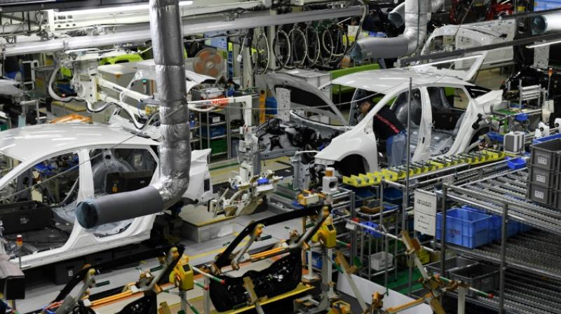 Passenger cars make up around 30 per cent of Japans total exports to the United States and Tokyo has already threatened Washington with retaliation at the WTO for the steel tariffs. (Photo: AFP)