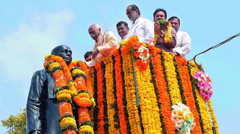 BJP leaders, led by Union minister Bandaru Dattatreya, offer floral tributes to Sardar Vallabhbhai Patel in Hyderabad on Monday. (Photo: DC)