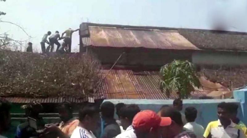 Firemen said the door was locked from the inside. Police suspect the three sisters killed themselves. (Photo: ANI | Twitter)