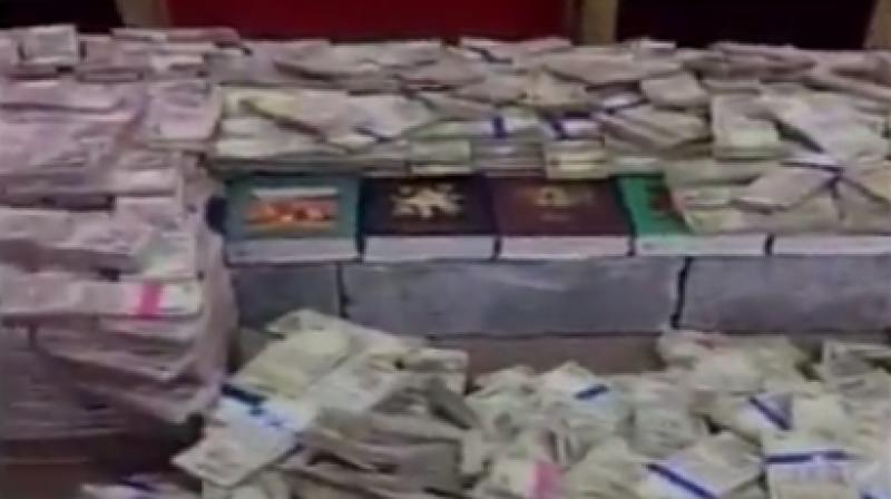 Cash recovered from Bomb Nagas house (Photo: ANI Twitter)