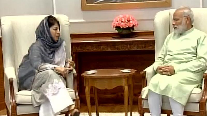 Prime Minister Narendra Modi with Chief Minister of Jammu and Kashmir Mehbooba Mufti on Monday. (Photo: ANI)
